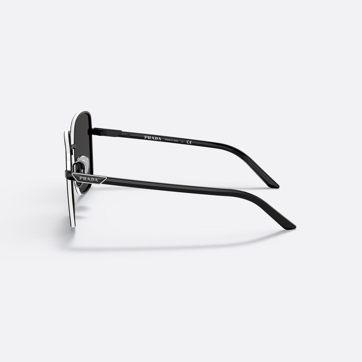 Prada PR 55YS 1AB5S0 sunglasses, black pillow frame for women, thin metal bridge, brand logo plaque on temple, side view