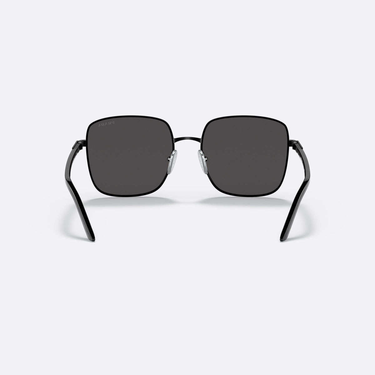 Prada PR 55YS 1AB5S0 sunglasses, black pillow frame for women, thin metal bridge, brand logo plaque on temple, back view