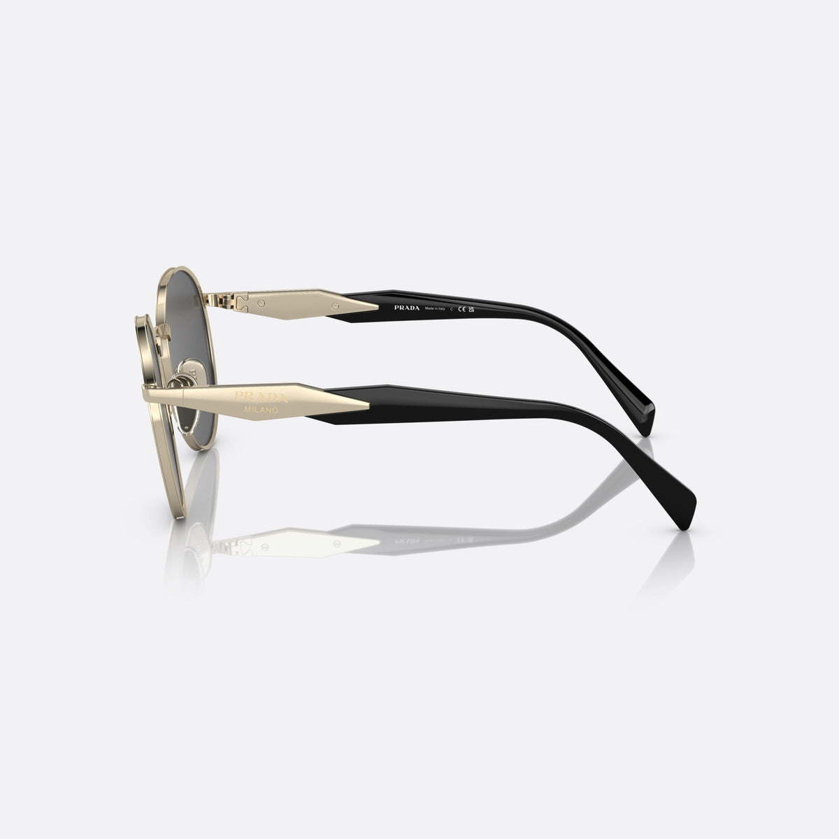 Prada PR 56ZS ZVN-5S0 sunglasses, gold round frame for women, plain metal bridge, brand lettering on temples, side view