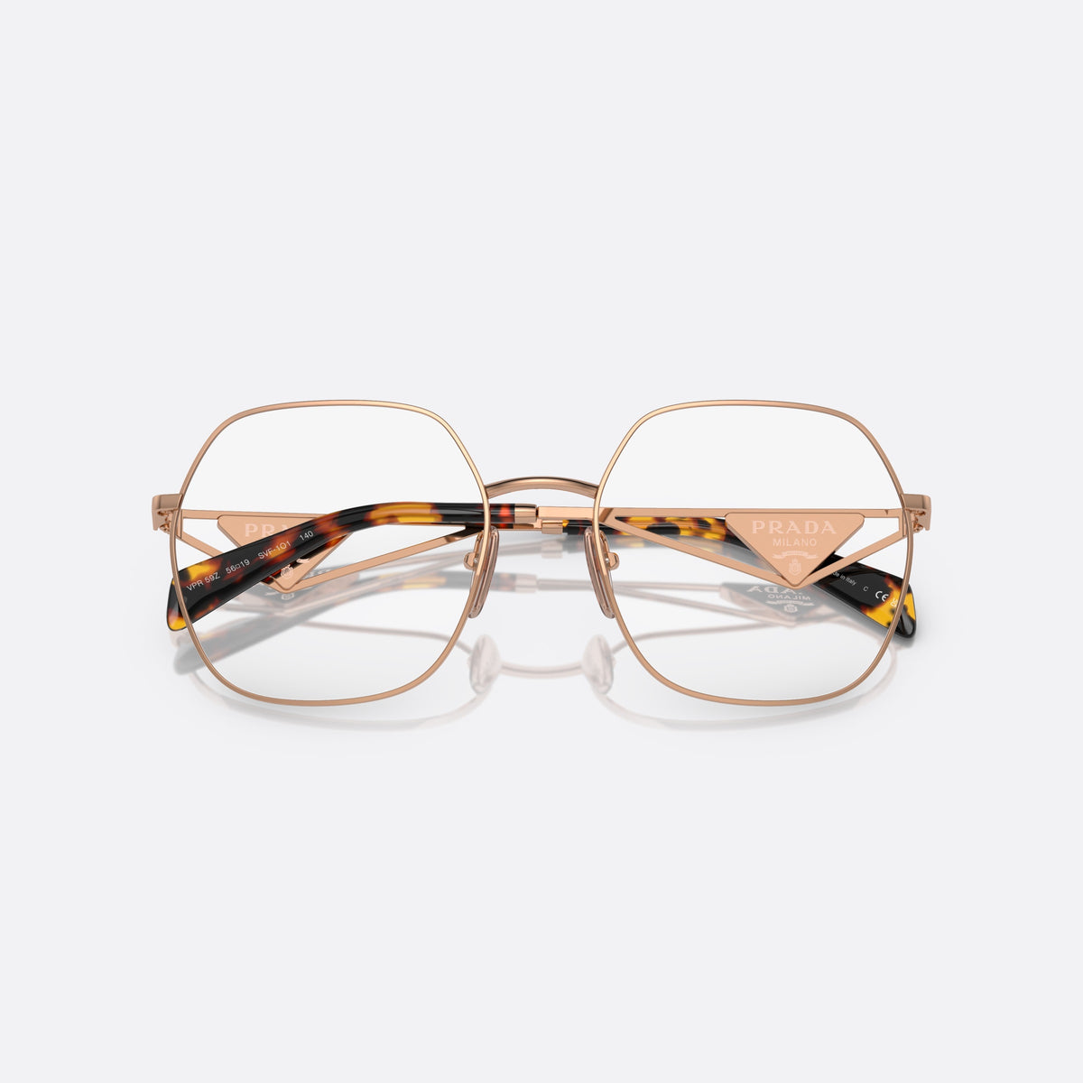 Prada PR 59ZV SVF-1O1 V eyeglasses, gold geometric frame for women, thin metal saddle bridge, brand lettering on plaque, folded