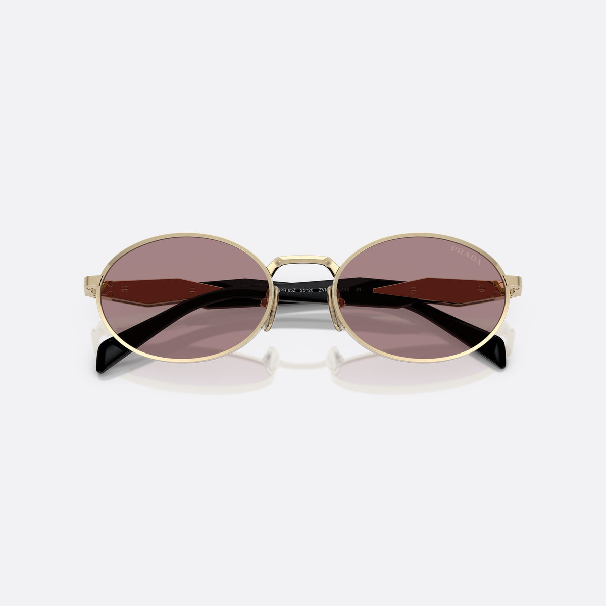 Prada PR 65ZS ZVN-20I sunglasses, gold oval frame, unisex, plain metal bridge, brand lettering on temples, folded