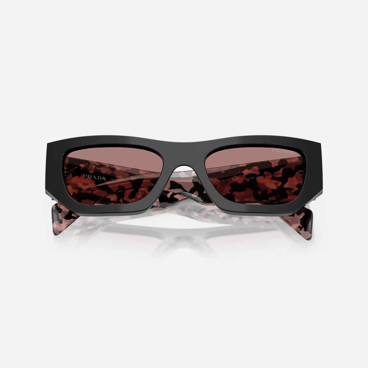 Prada PR A01S 13P60B sunglasses, black pillow frame for women, plain bridge, integrated into frame, wide tapered temples, folded