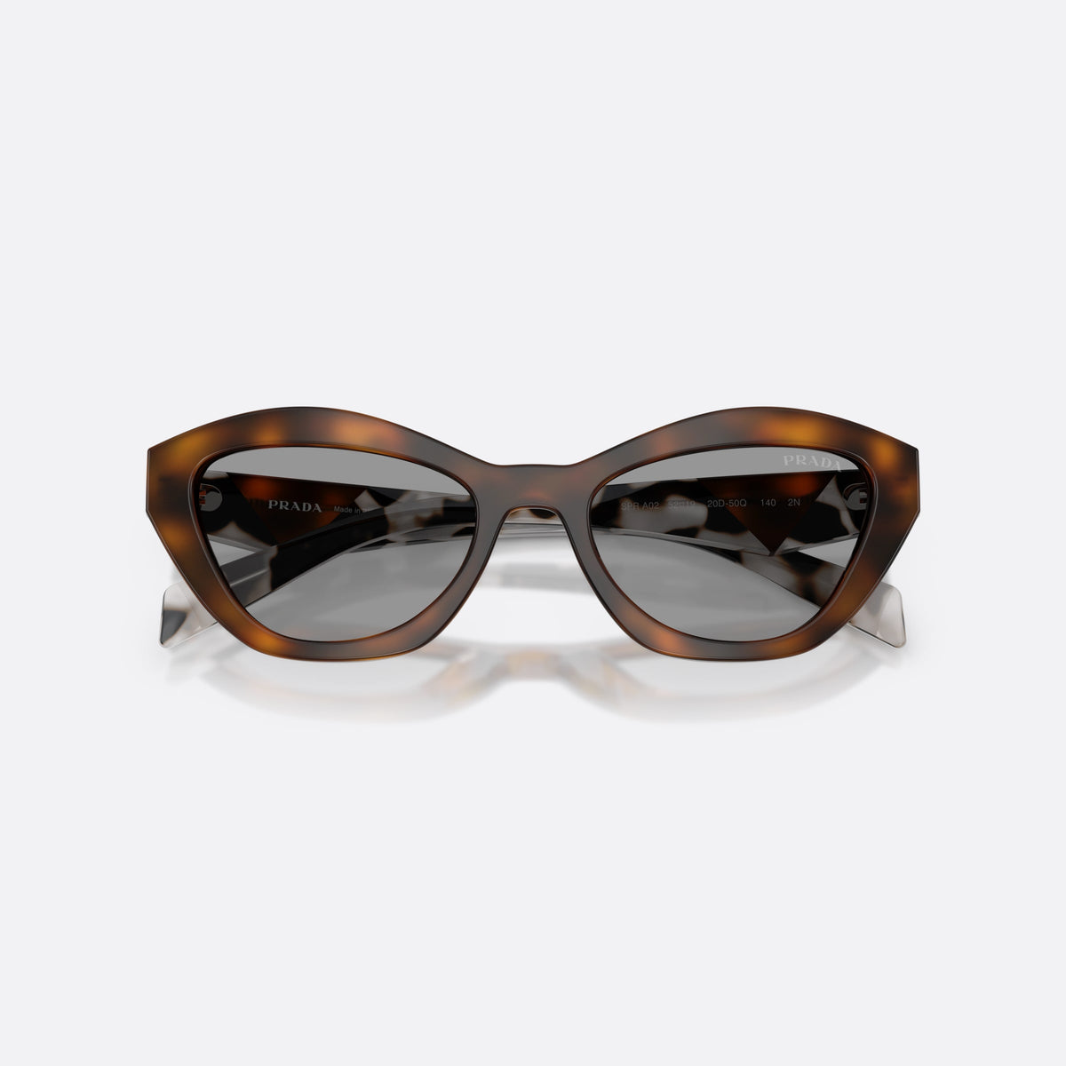 Prada PR A02S 20D50Q sunglasses, havana butterfly frame for women, plain bridge, brand lettering on lens, full-rim frame, folded