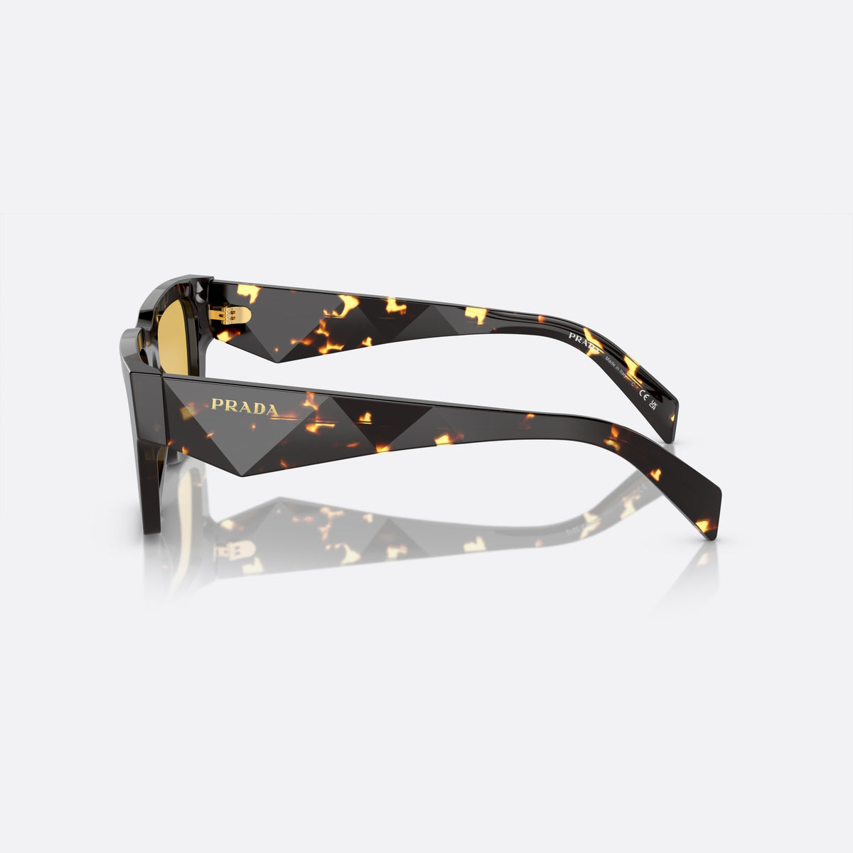 Prada PR A06S 16O-10C C sunglasses, brown pillow frame for men, plain integrated bridge, brand lettering on the temples, side view