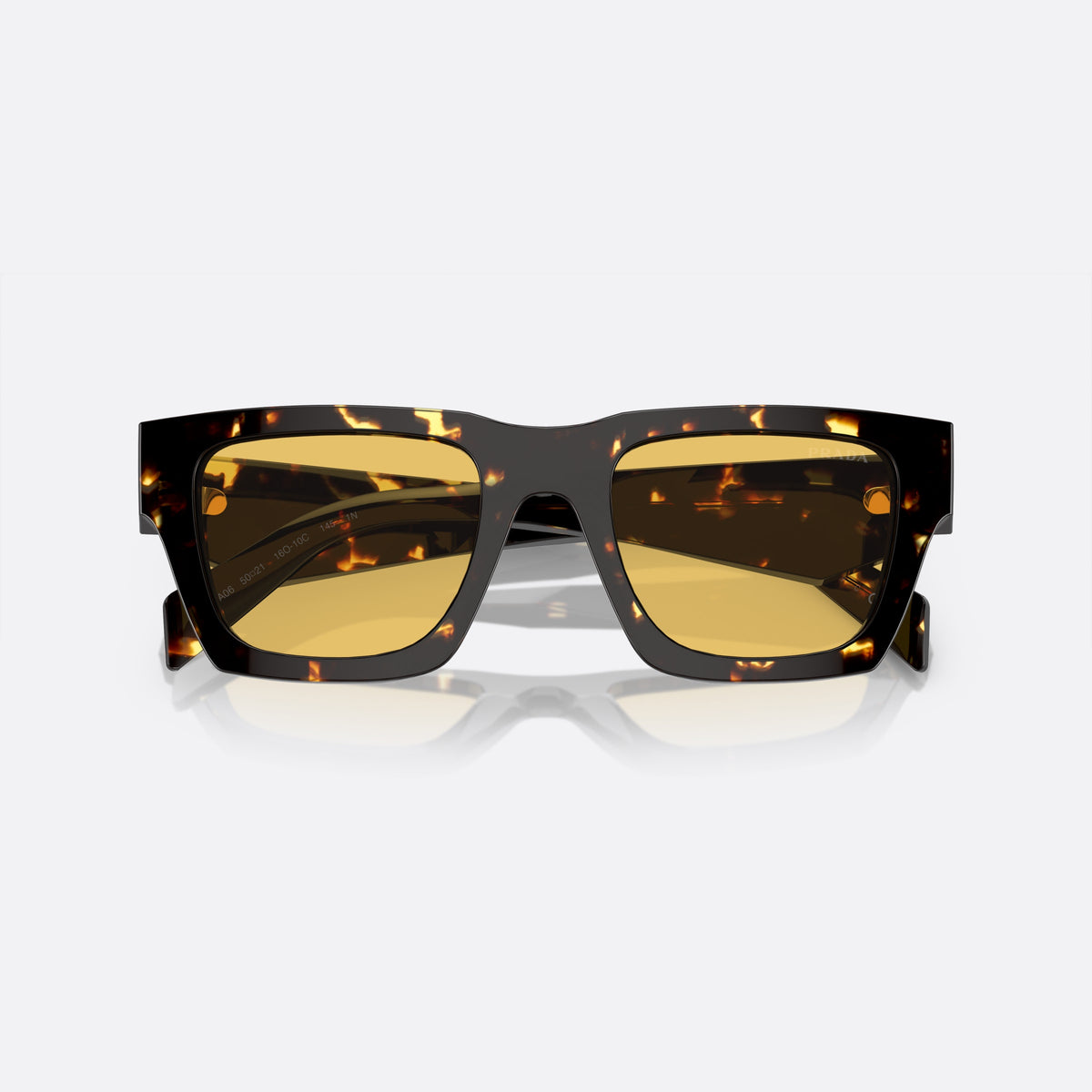 Prada PR A06S 16O-10C C sunglasses, brown pillow frame for men, plain integrated bridge, brand lettering on the temples, folded