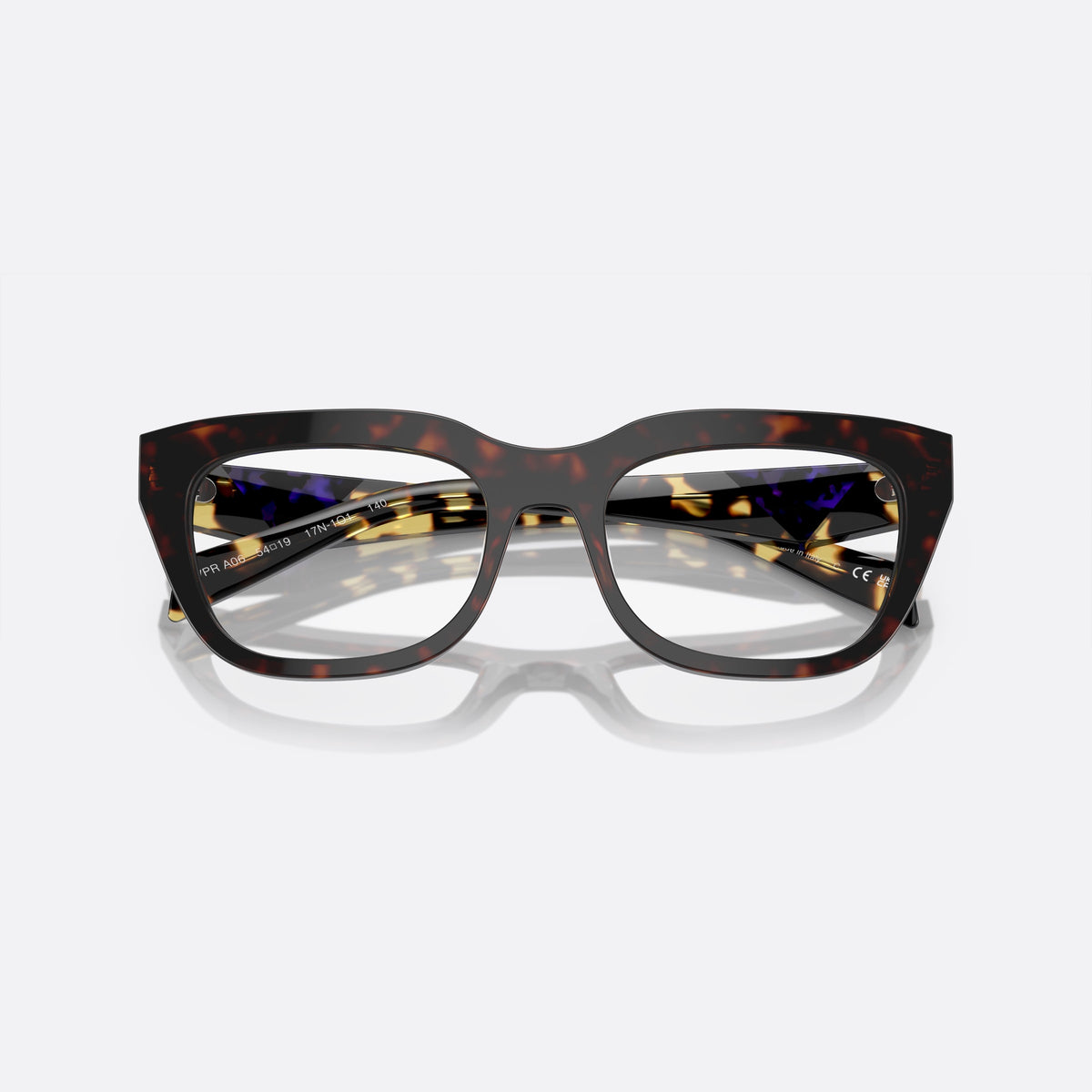Prada PR A06V 17N-1O1 L eyeglasses, havana geometric frame for women, plain bridge, brand lettering on temples, full-rim frame, folded