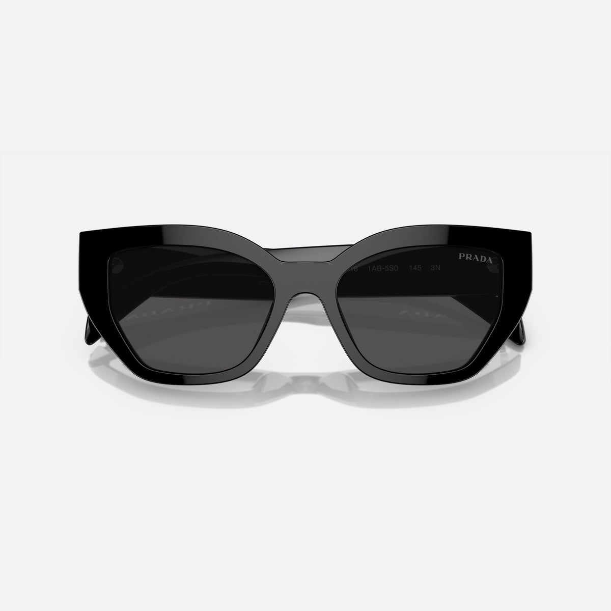 Prada PR A09S 1AB-5S0 N sunglasses, black butterfly frame for women, plain bridge, brand lettering on temples, wide temples, folded