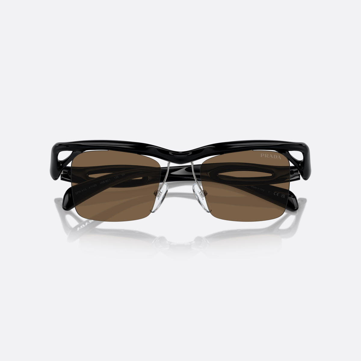 Prada PR A15S 1AB8C1 sunglasses, black rectangle frame for men, double bridge with wavy profile, brand lettering on temples, folded