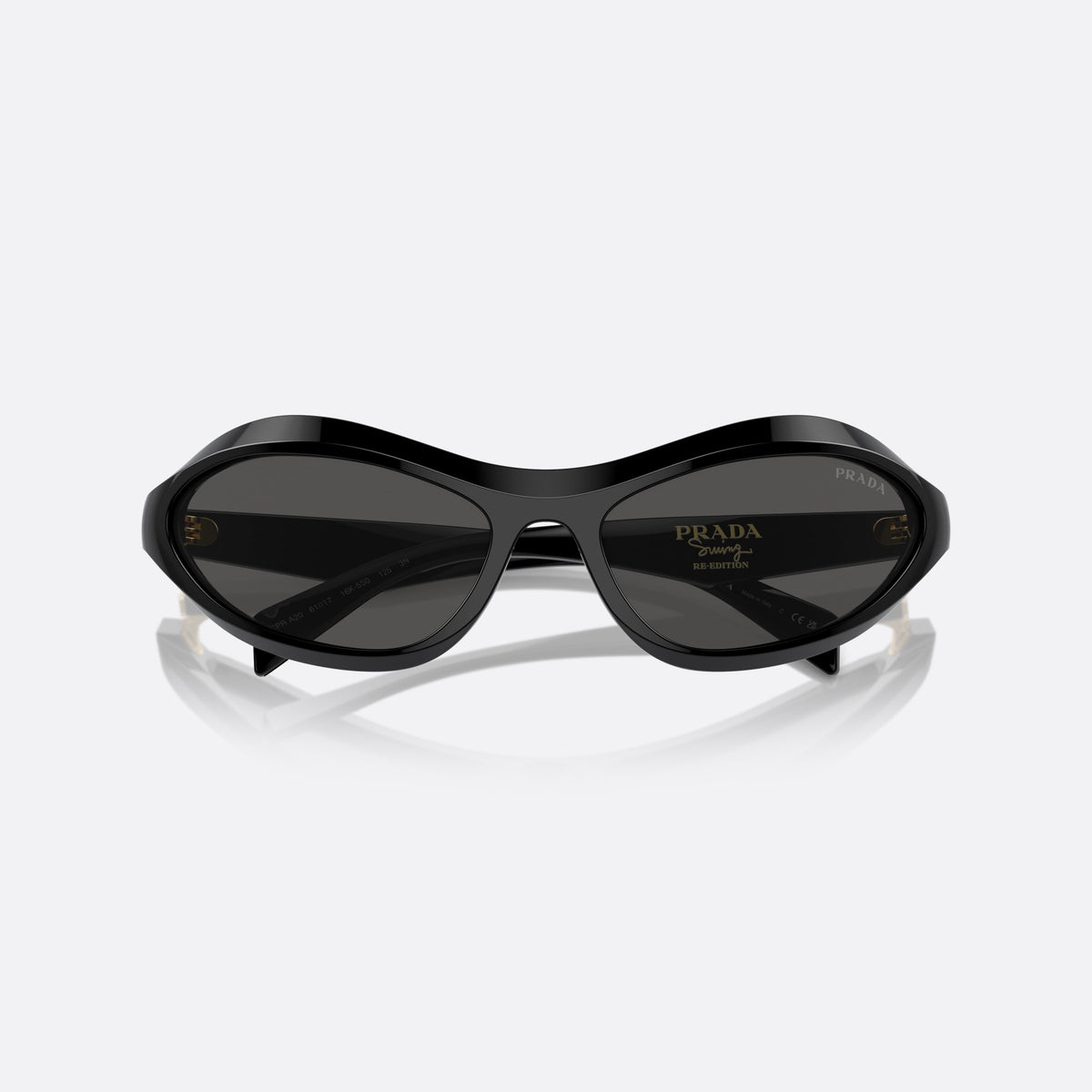 Prada PR A20S 16K5S0 sunglasses, black cat eye frame for women, plain bridge, integrated into frame, brand logo on front rim, folded