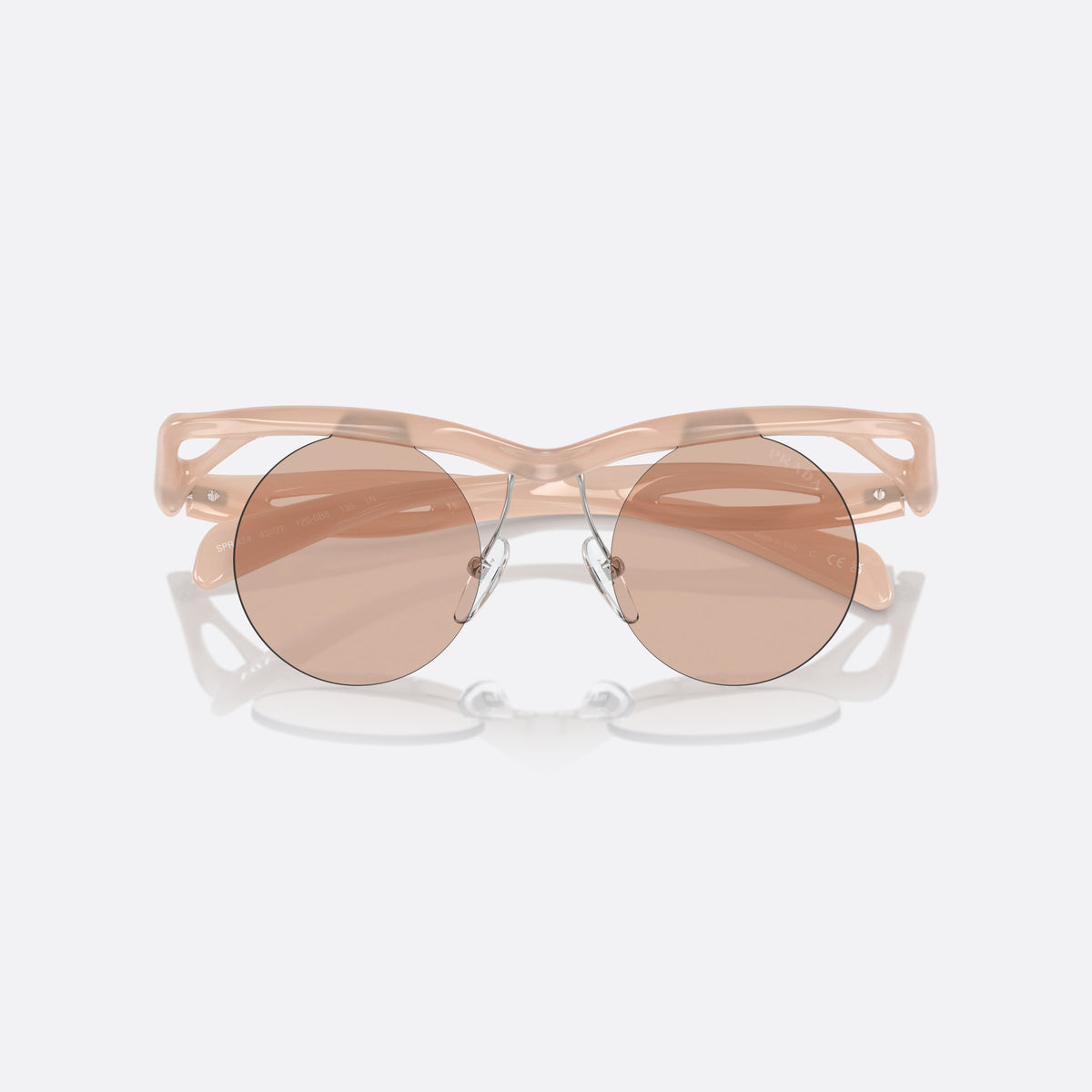 Prada PR A24S 12S0B8 sunglasses, pink round frame for women, brand lettering on temples, wavy tapered temples, folded