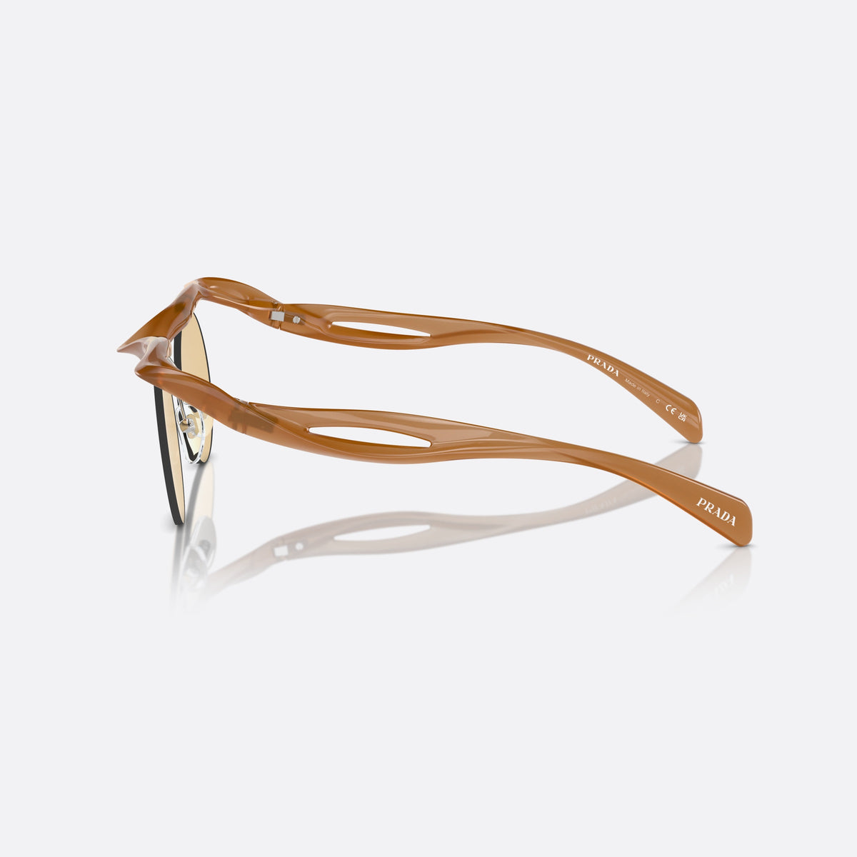 Prada PR A24S 13S80E sunglasses, brown round frame for women, brand lettering on the temples, solid tinted lenses, side view