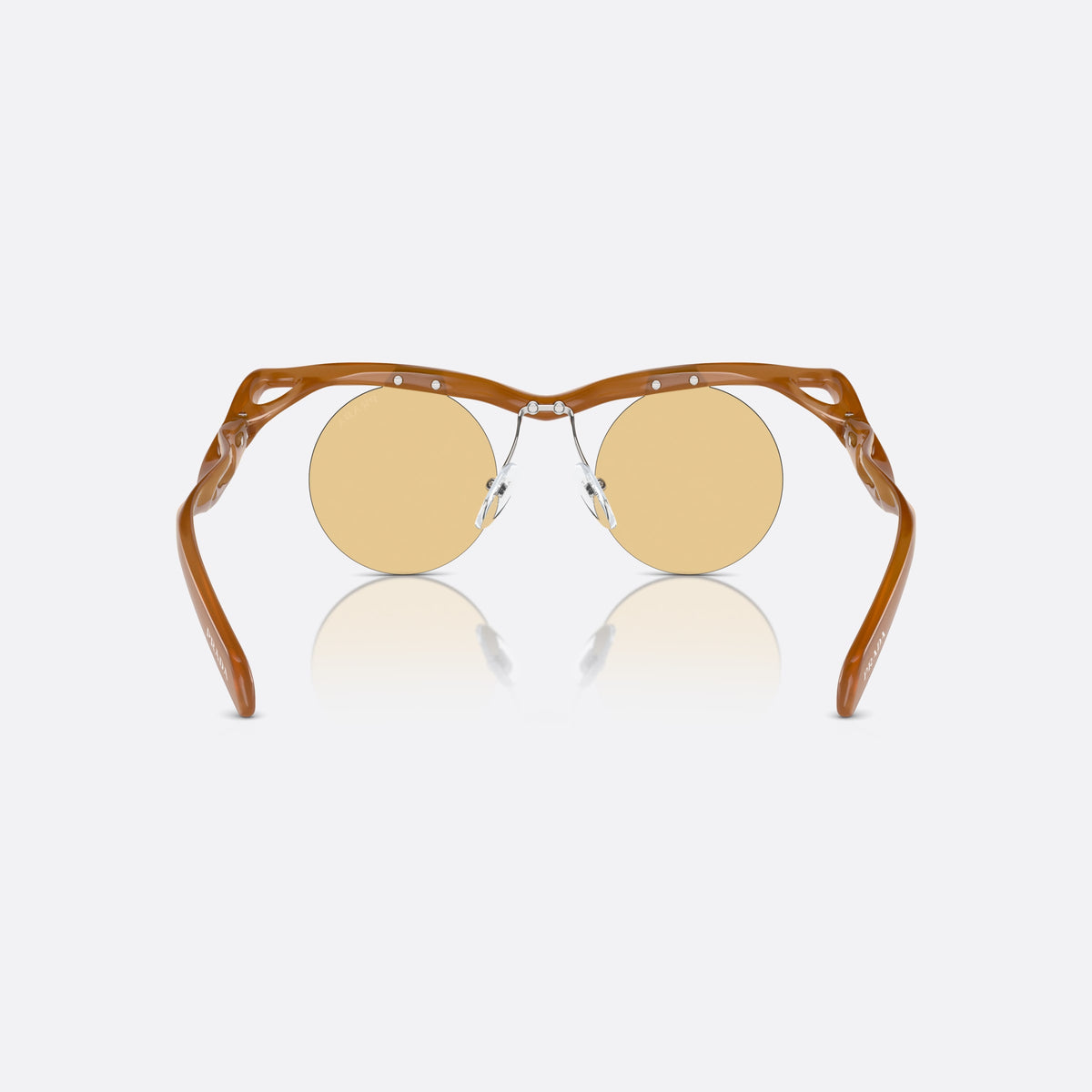 Prada PR A24S 13S80E sunglasses, brown round frame for women, brand lettering on the temples, solid tinted lenses, back view