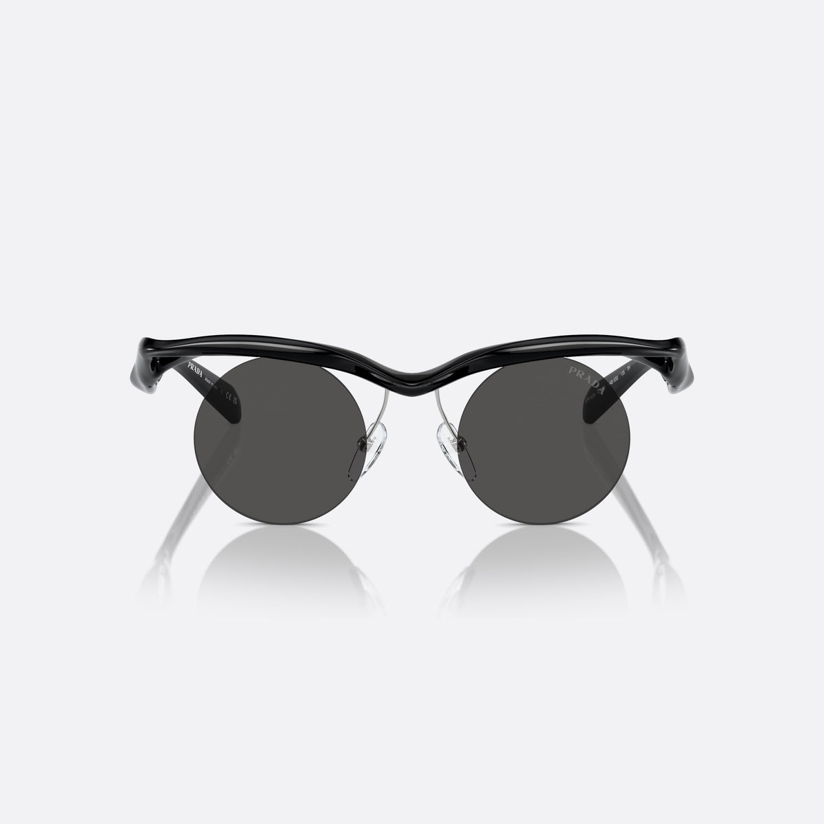 Prada PR A24S 1AB5S0 sunglasses, black round frame for women, thick wavy bridge, brand lettering on temples, front view