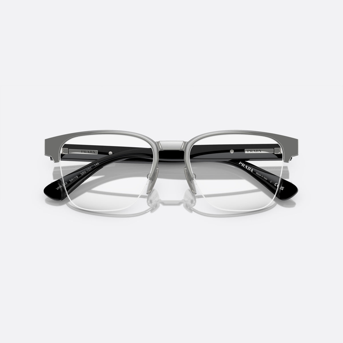 Prada PR A52V 5AV-1O1 C eyeglasses, grey geometric frame for men, metal bridge with flat plate, brand lettering on the temples, folded