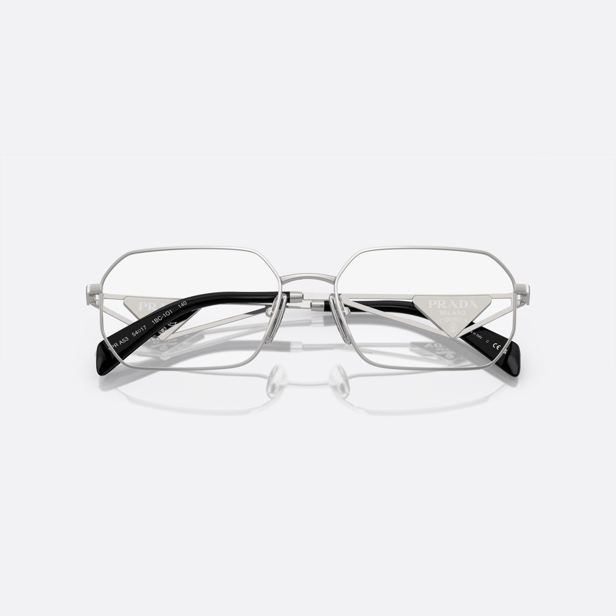 Rame ochelari de vedere Prada PR A53V 1BC-1O1 C, geometrica argintiu, pentru femei, punte metalică subțire, litere ale brandului pe placă, cu brațele pliate