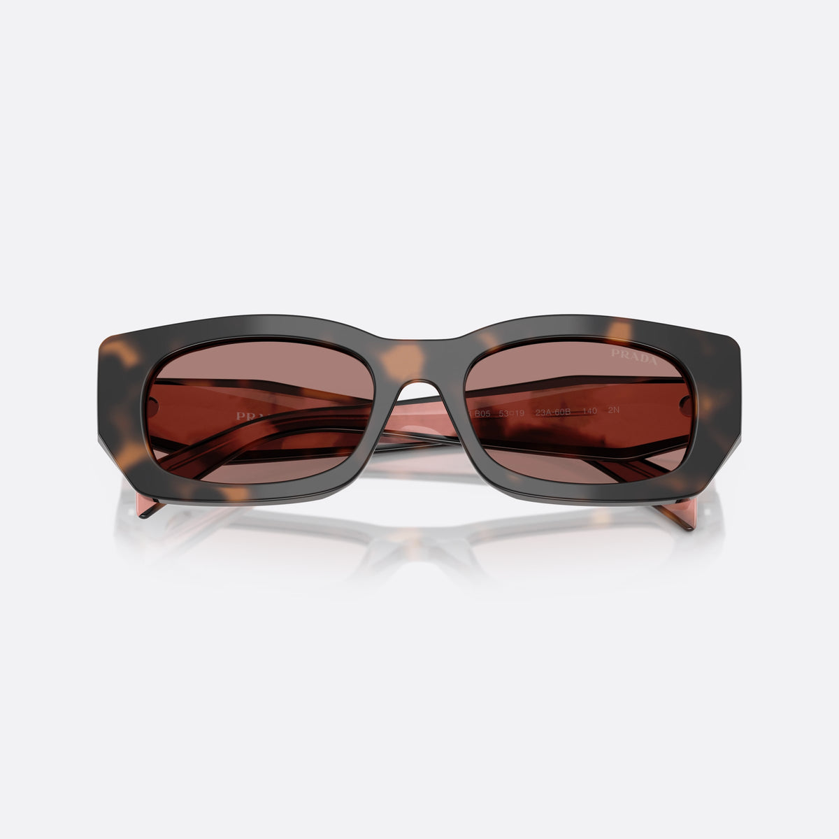 Prada PR B05S 23A60B MABW sunglasses, pink squared frame for women, plain bridge, brand lettering on temples, full-rim frame, folded