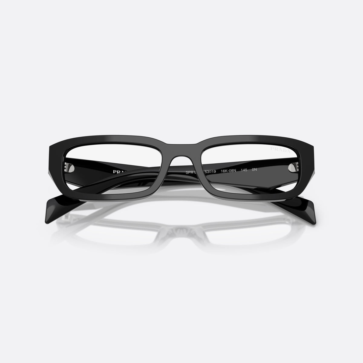 Prada PR B06S 16K08N BL sunglasses, black rectangle frame for women, plain bridge, brand lettering on temples, full-rim frame, folded
