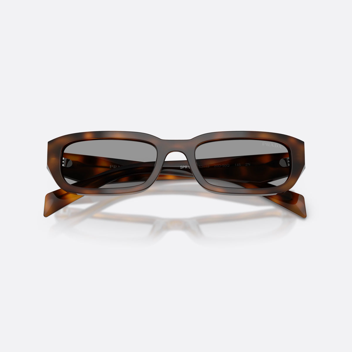 Prada PR B06S 20D50Q sunglasses, havana rectangle frame for women, plain bridge, brand logo plaque on temple, full-rim frame, folded