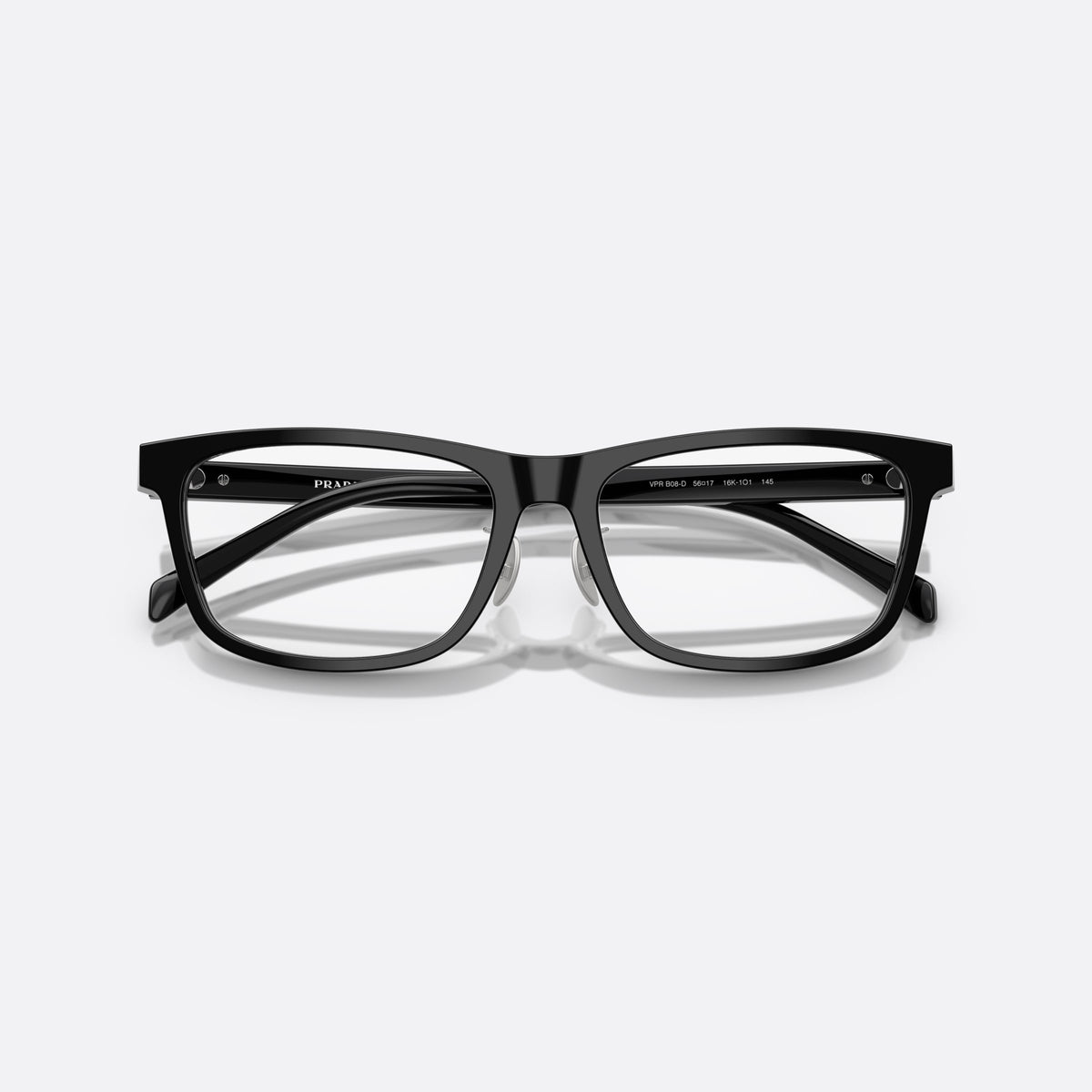 Prada PR B08VD 16K1O1 eyeglasses, black visor frame for men, plain bridge, integrated design, brand lettering on temples, folded