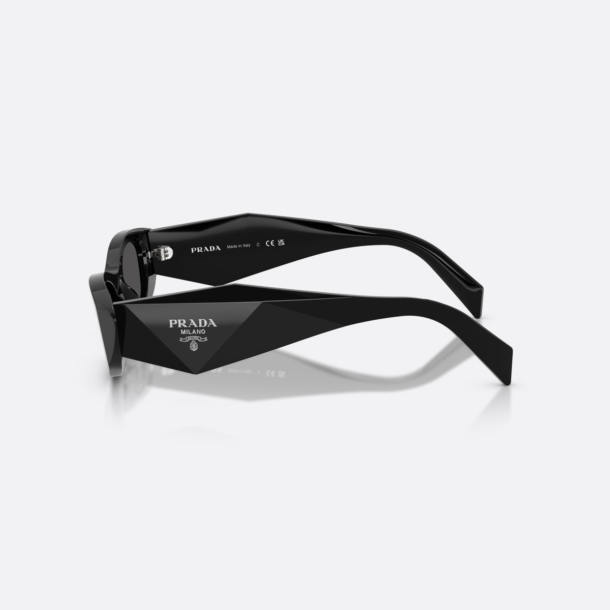 Prada PR B16S 16K08Z sunglasses, black oval frame for women, plain integrated bridge, brand lettering on temples, side view