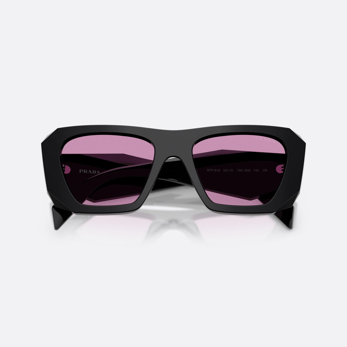 Prada PR B18S 16K30G sunglasses, black square frame for women, plain integrated bridge, brand lettering on temples, folded