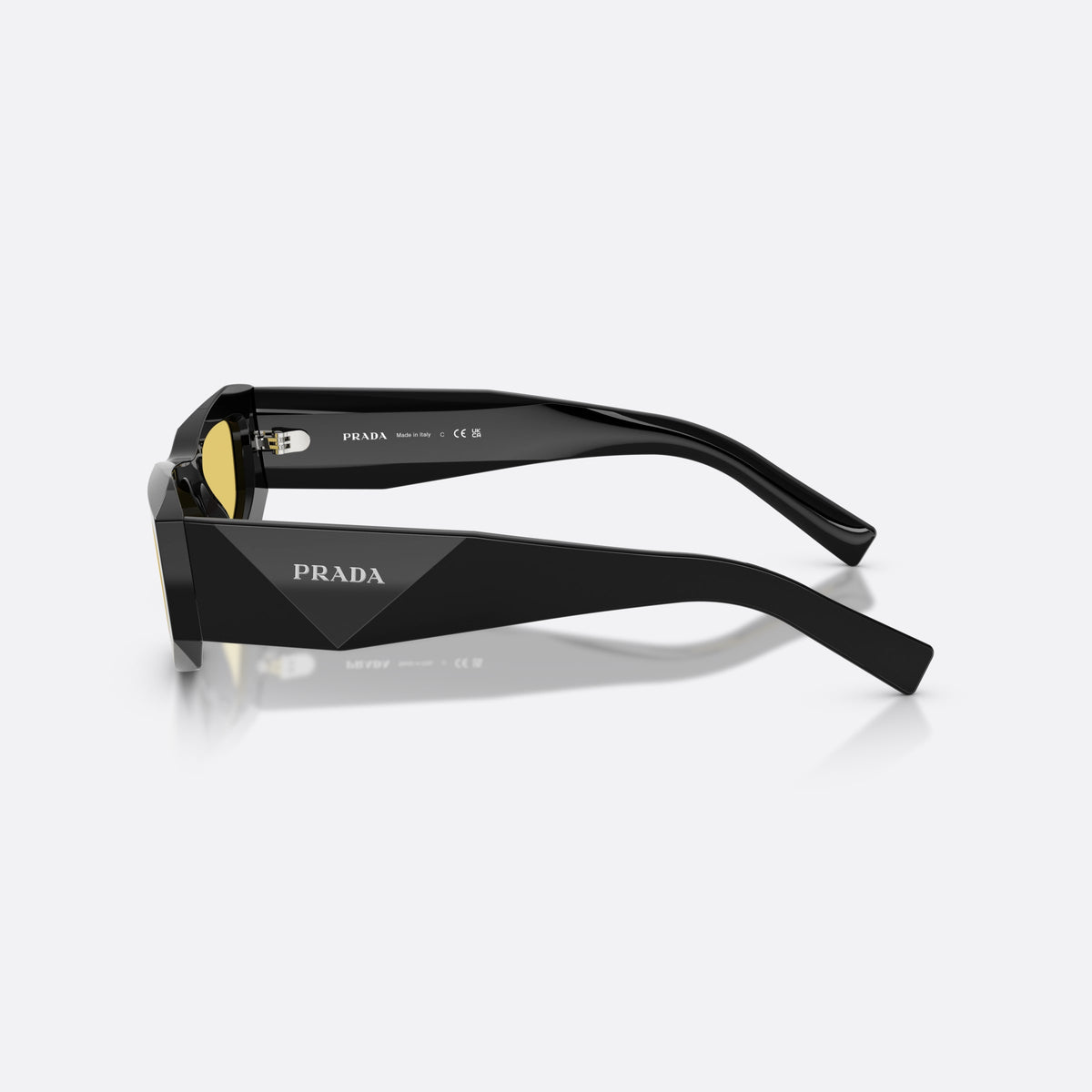 Prada PR B19S 16K455 sunglasses, black pillow frame for men, plain integrated bridge, brand lettering on temples, side view