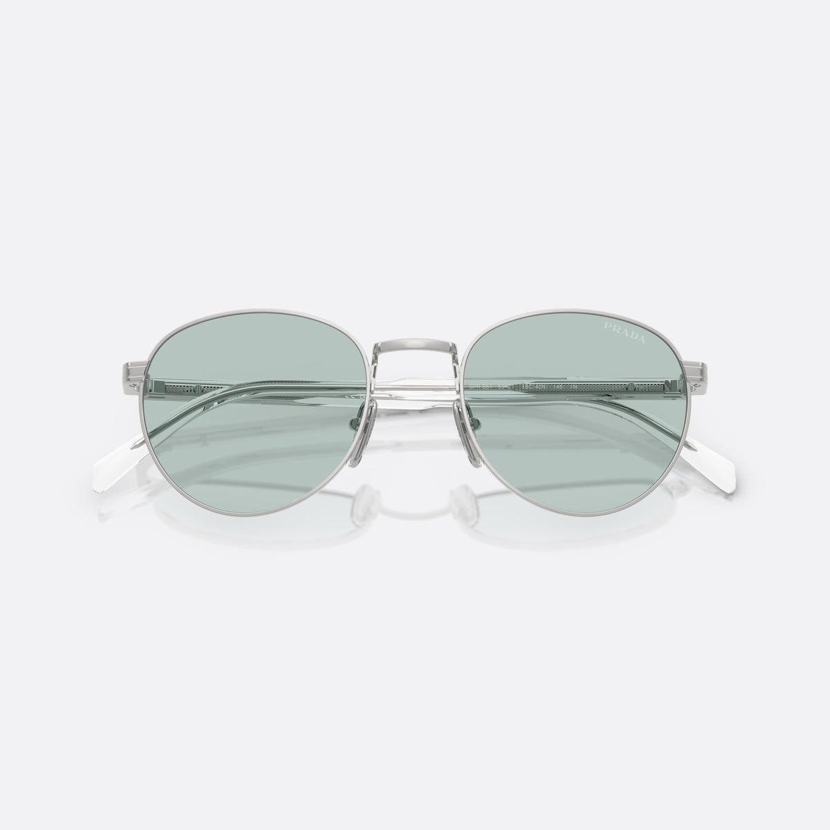 Prada PR B51S 1BC40N SIBL sunglasses, silver oval frame for men, plain metal bridge, brand lettering on the temples, folded