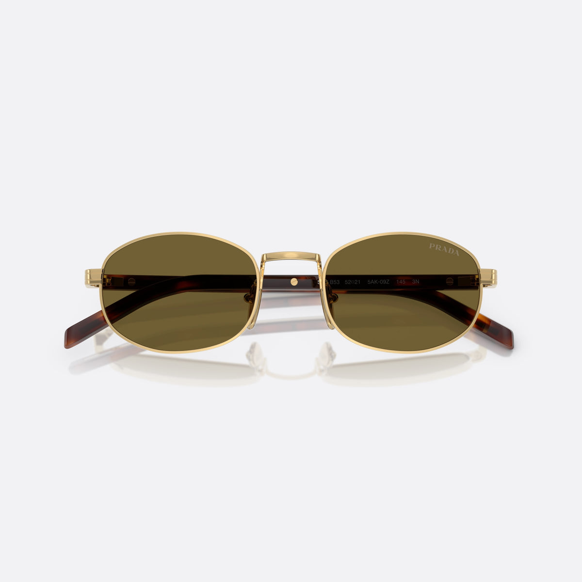 Prada PR B53S 5AK09Z sunglasses, gold oval frame for women, plain metal bridge, brand lettering on temples, folded