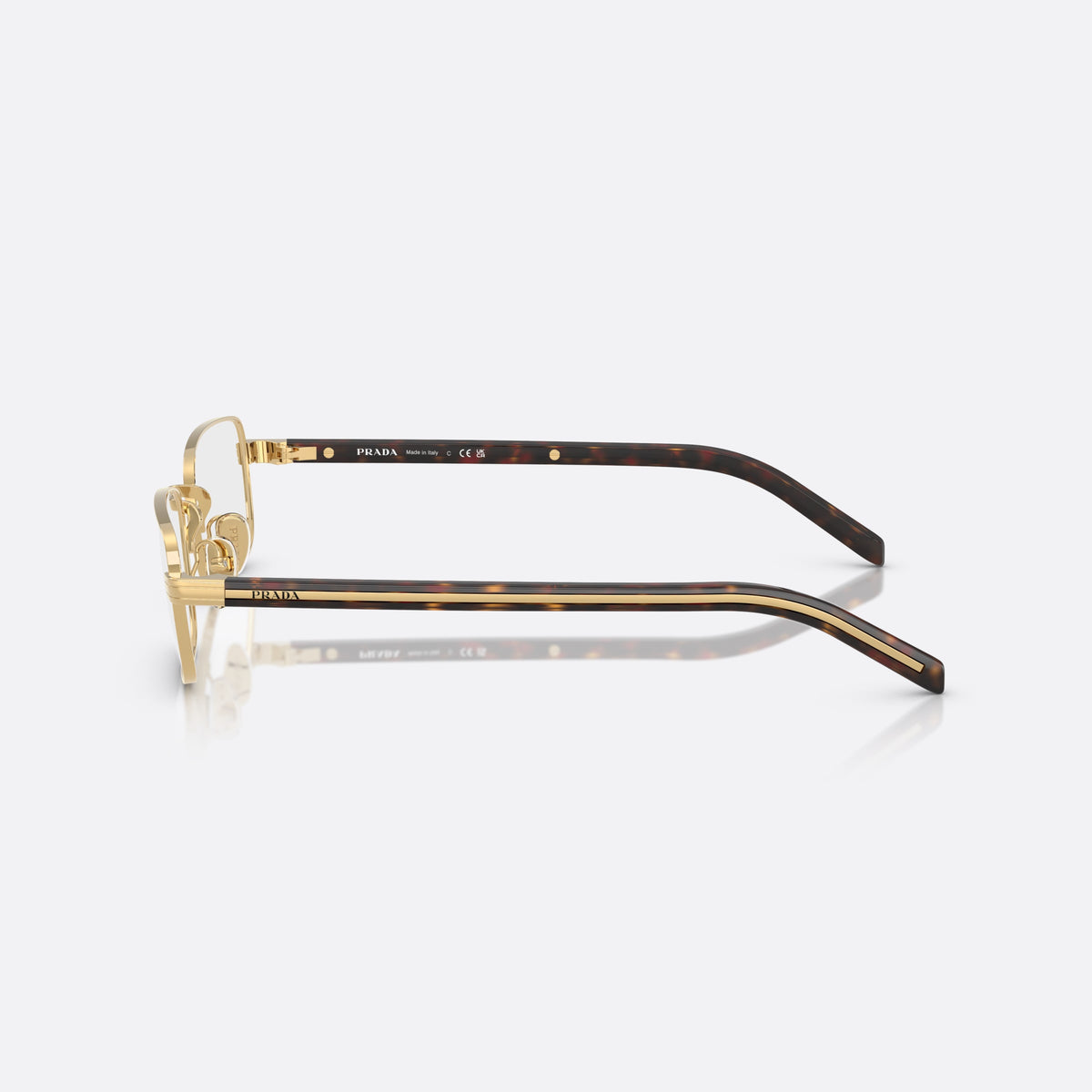 Prada PR B54V 5AK1O1 eyeglasses, gold visor frame for women, plain metal bridge, brand lettering on temples, side view