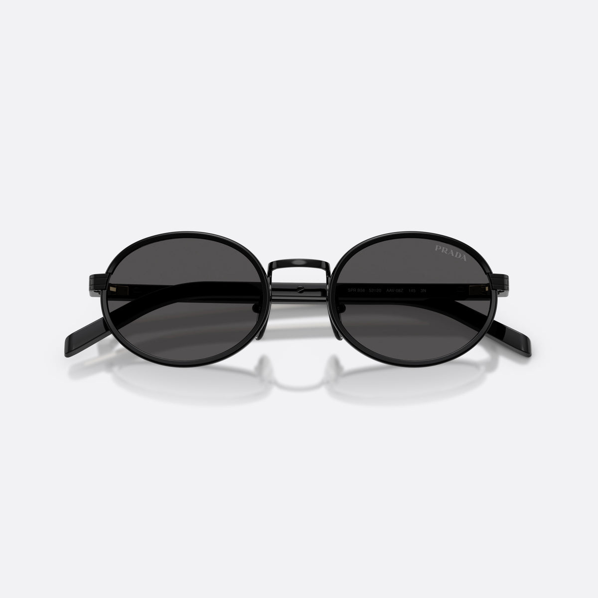 Prada PR B56S AAV08Z sunglasses, black oval frame for women, plain metal bridge, brand lettering on temples, folded