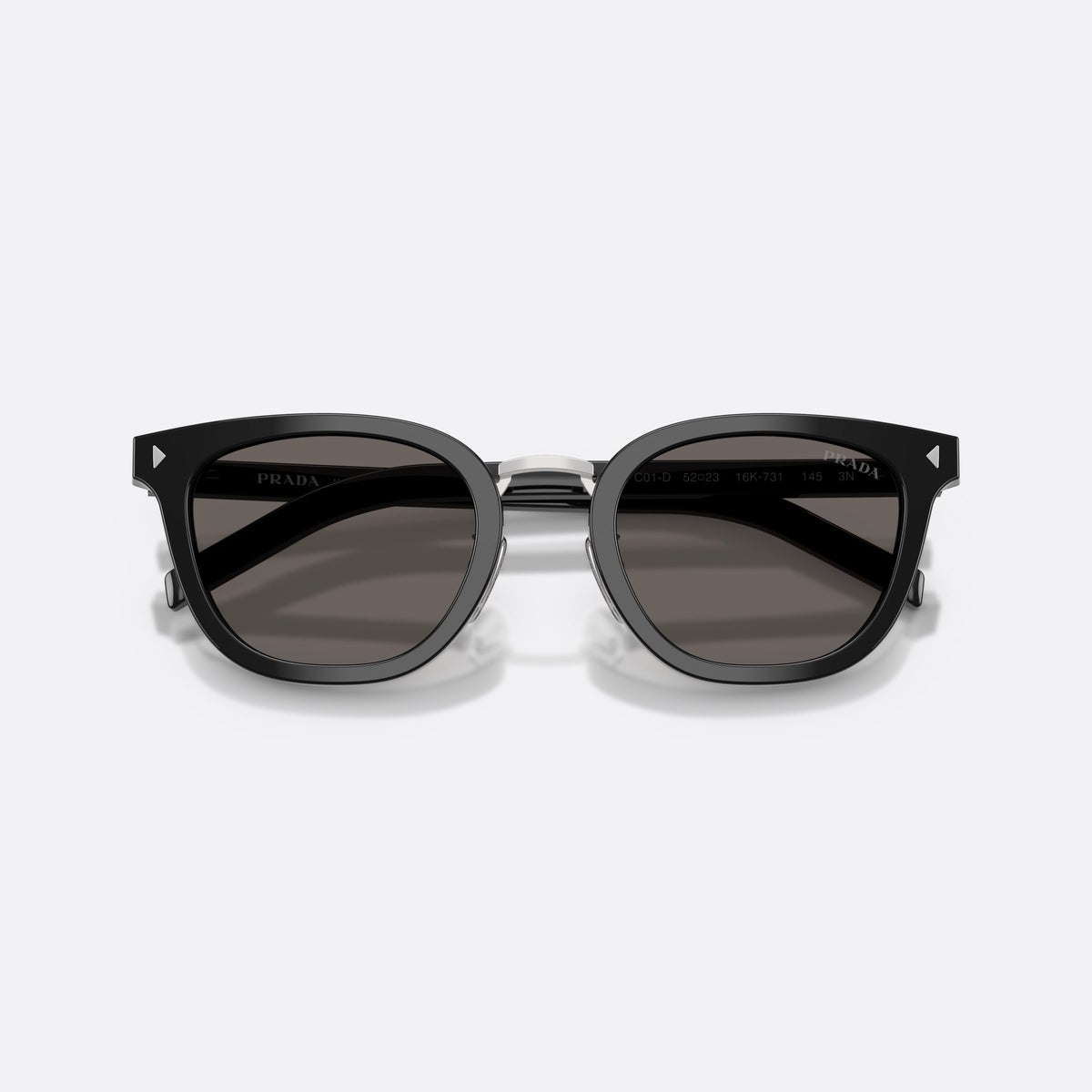 Prada PR C01SD 16K731 sunglasses, black cat eye frame for men, brand lettering on lens rim, full-rim frame, folded