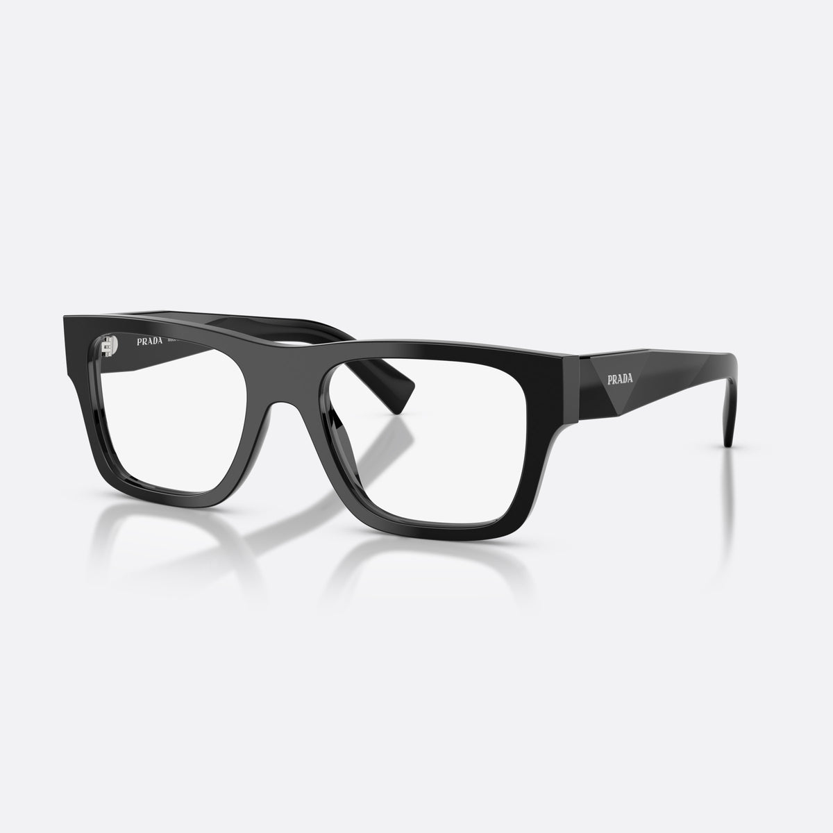 Prada PR C01V 16K1O1 eyeglasses, black pillow frame for men, plain saddle bridge, brand lettering on temples