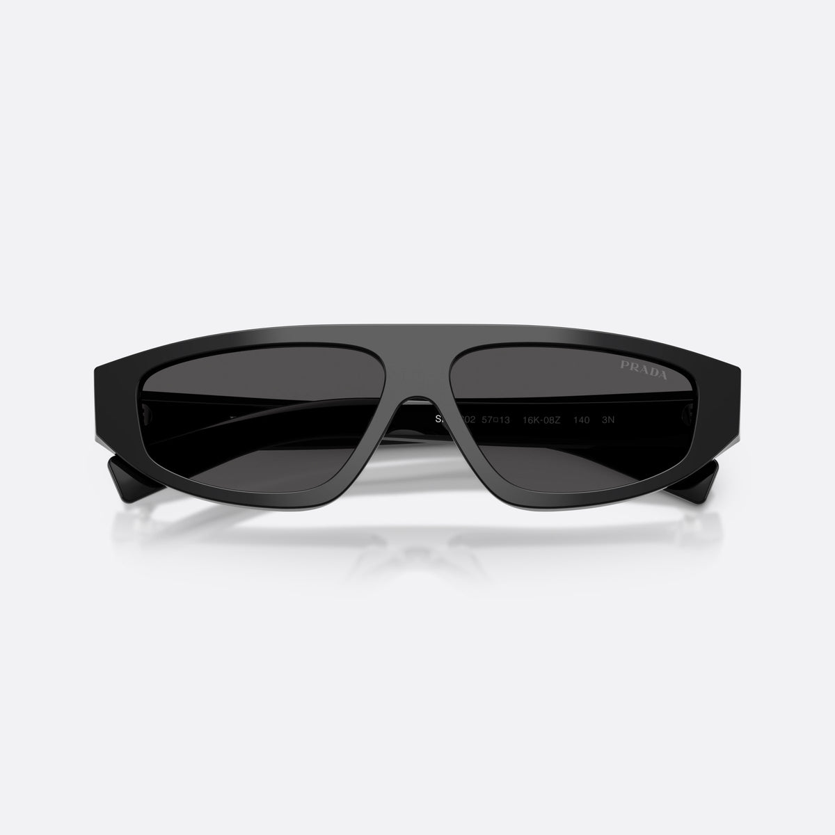 Prada PR C02S 16K08Z sunglasses, black irregular frame for men, plain integrated bridge, brand lettering on temples, folded