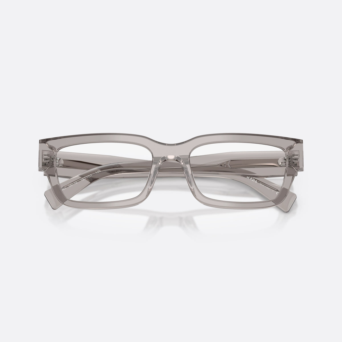 Prada PR C02V 18J1O1 eyeglasses, grey pillow frame for men, plain acetate-style bridge, brand lettering on temples, folded