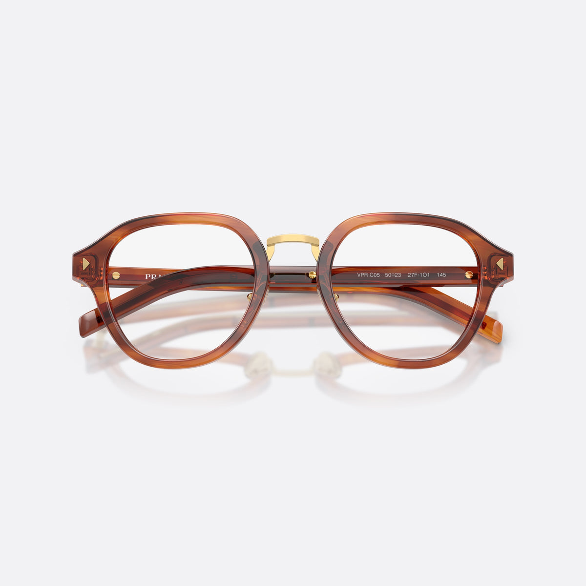 Prada PR C05V 27F1O1 eyeglasses, brown phantos frame for men, brand lettering on temples, slim tapered temples, folded