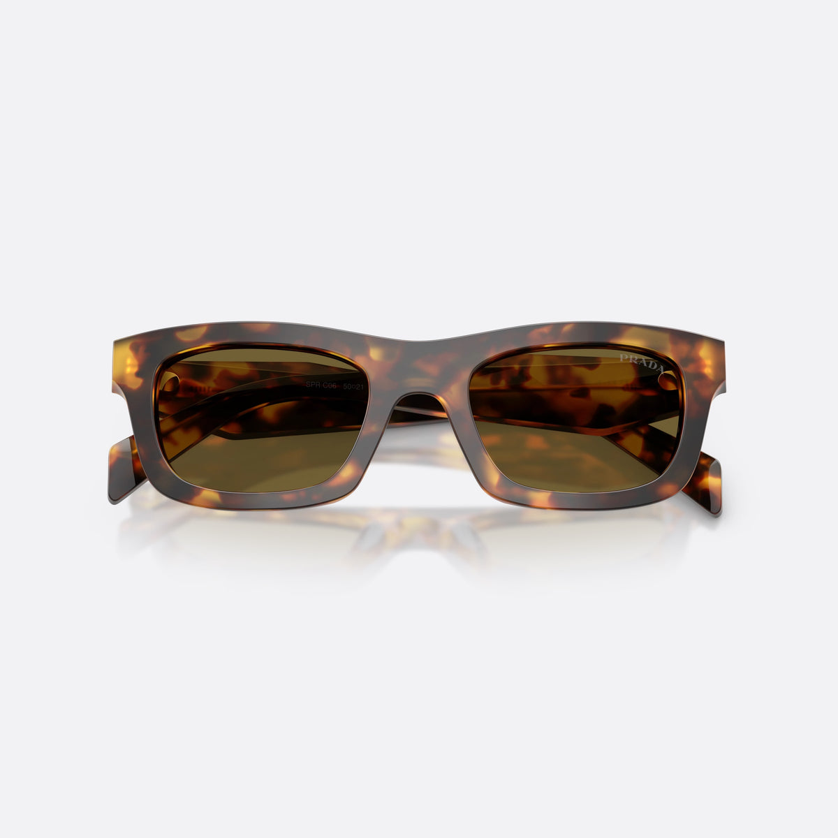 Prada PR C06S 14L09Z sunglasses, havana pillow frame for women, plain bridge, low-profile, brand lettering on temples, folded