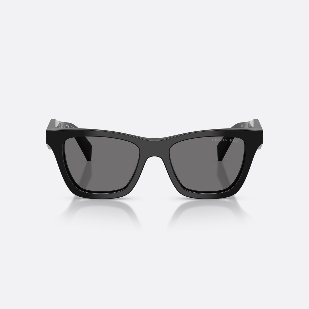 Prada PR C07S 16K90T sunglasses, black butterfly frame for women, plain integrated bridge, brand lettering on temples, front view