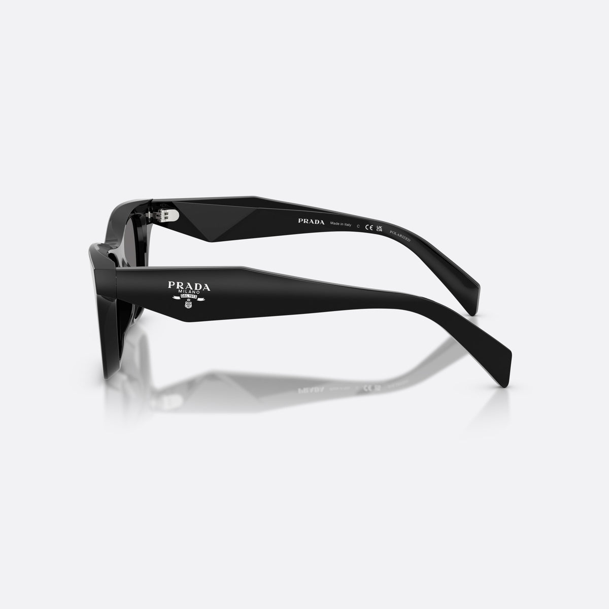Prada PR C07S 16K90T sunglasses, black butterfly frame for women, plain integrated bridge, brand lettering on temples, side view