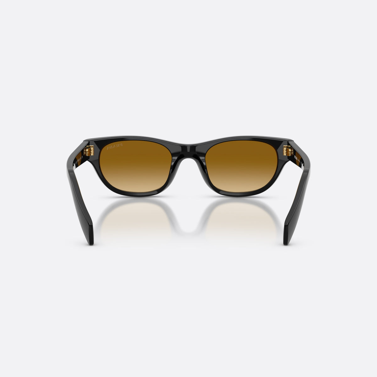 Prada PR C08S 16K10X sunglasses, black cat eye frame for women, plain integrated bridge, brand lettering on temples, back view