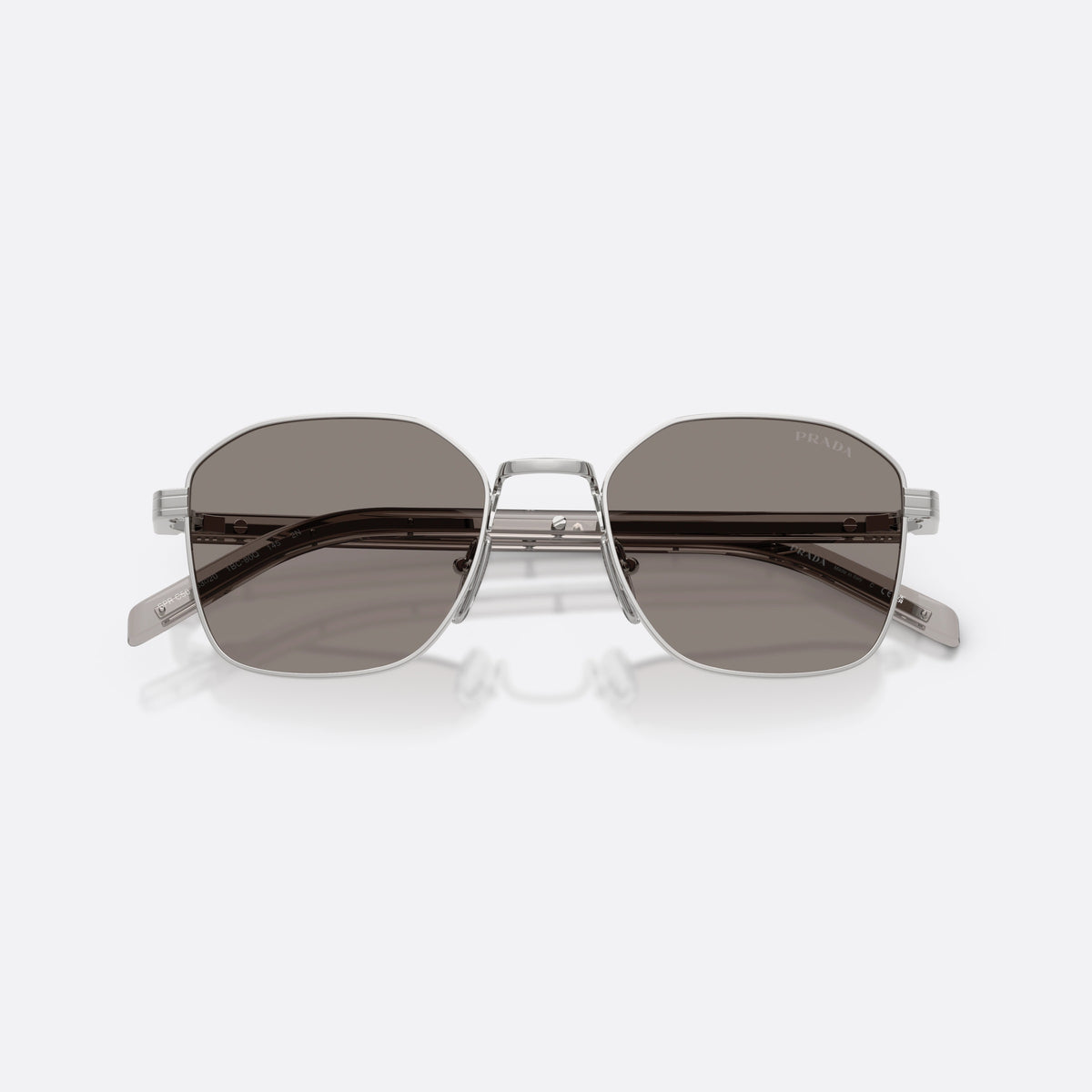 Prada PR C50S 1BC80Q sunglasses, silver square frame for men, plain metal bridge, brand lettering on temples, folded