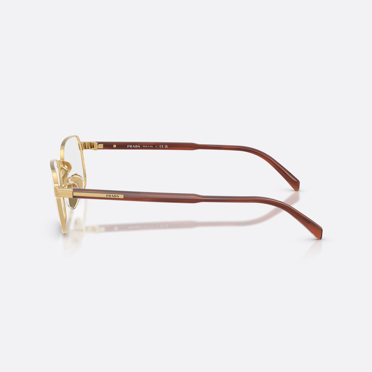 Prada PR C50VD 5AK1O1 eyeglasses, gold pillow frame for men, plain metal bridge, brand lettering on temples, side view