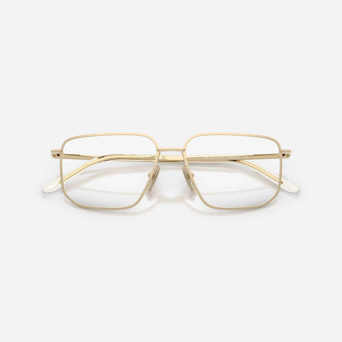 Prada PR C52V ZVN1O1 eyeglasses, gold rectangle frame for women, plain metal bridge, brand lettering on the temples, folded