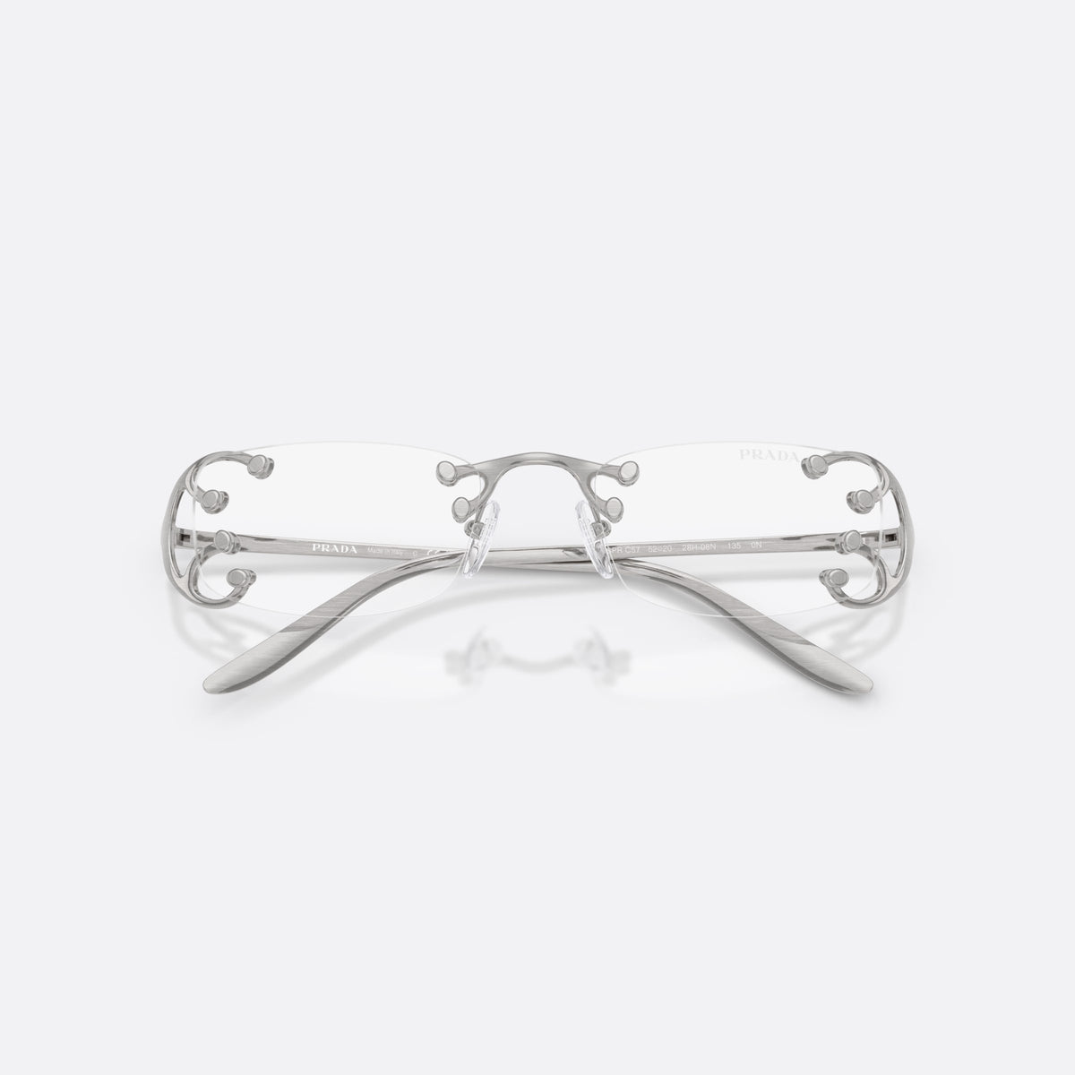 Prada PR C57S 28H08N sunglasses, silver rectangle frame for women, double bridge with metal knobs, metal hinges, folded