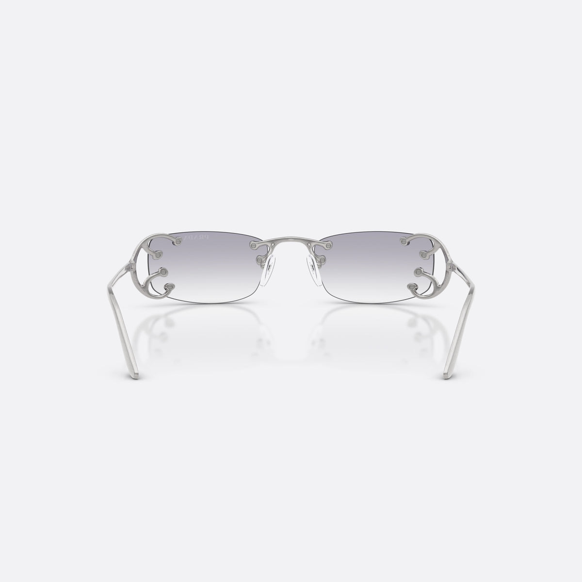 Prada PR C57S 28H40V sunglasses, silver rectangle frame for women, plain metal bridge, brand lettering on temples, back view