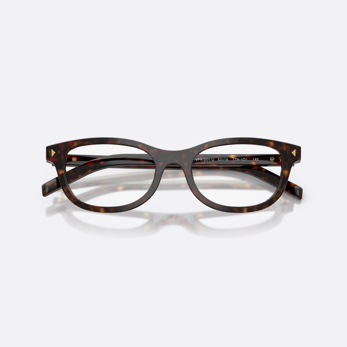 Prada PR D01VU 17N1O1 eyeglasses, havana oval frame for women, plain combined bridge, brand lettering on temples, folded