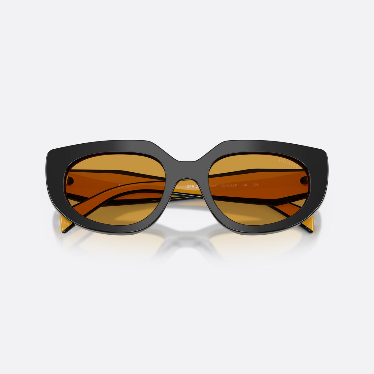Prada PR D02S 02K50P sunglasses, black oval frame for women, saddle-style bridge, plain, brand lettering on temples, folded