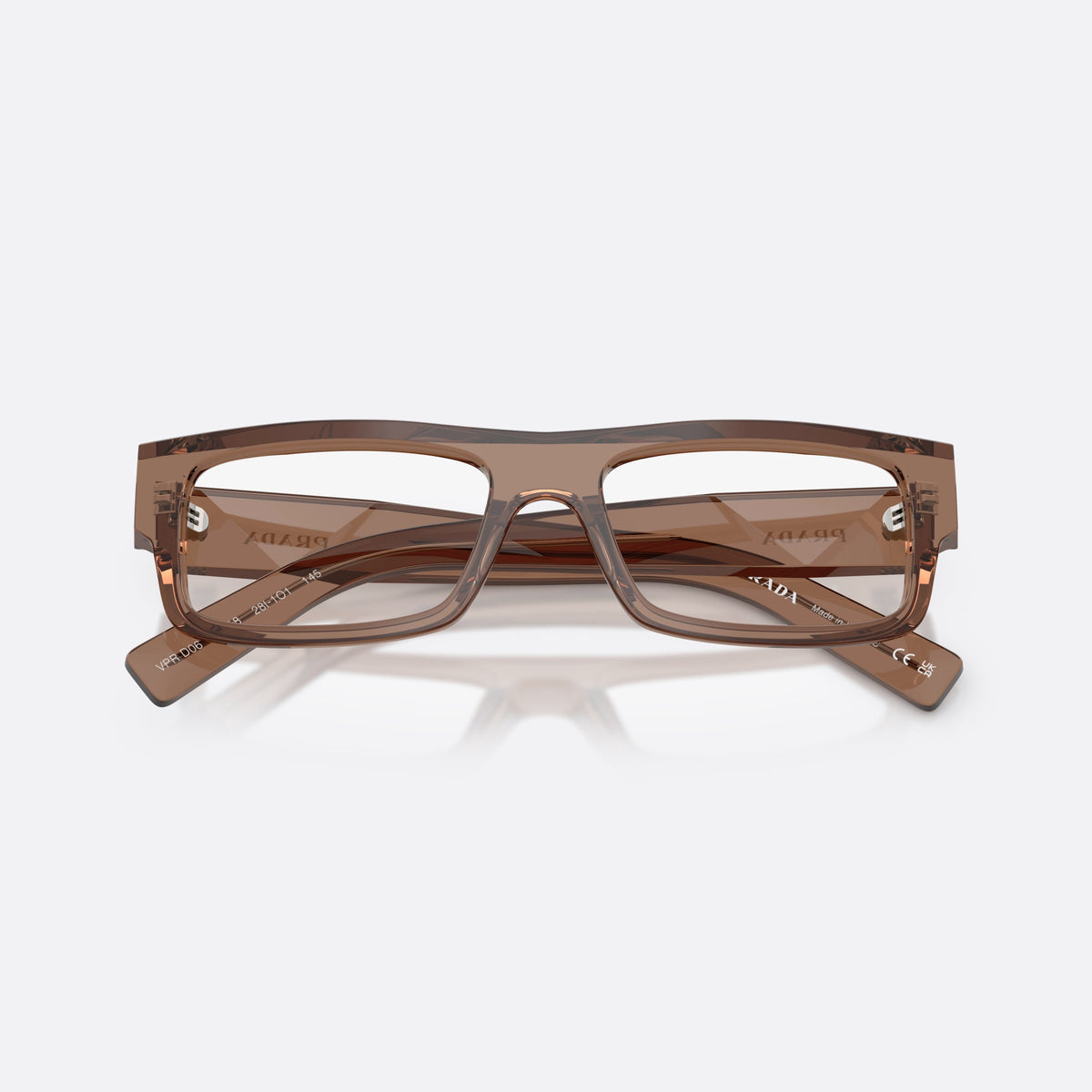 Prada PR D06V 28I1O1 eyeglasses, brown rectangle frame for men, plain saddle bridge, brand lettering on temples, folded