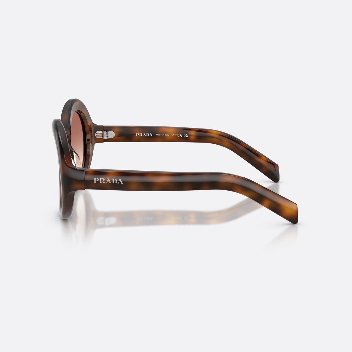 Prada PR D08SU 20D70X sunglasses, havana round frame for women, brand lettering on temple, wide tapered temples, side view
