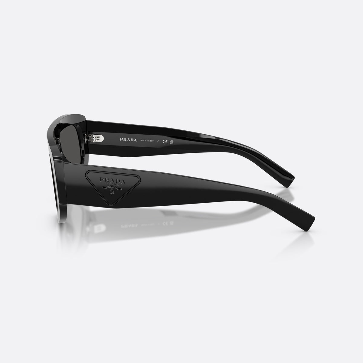Prada PR D10S 16K08Z sunglasses, black irregular frame for men, single integrated bridge, brand lettering on lenses, side view
