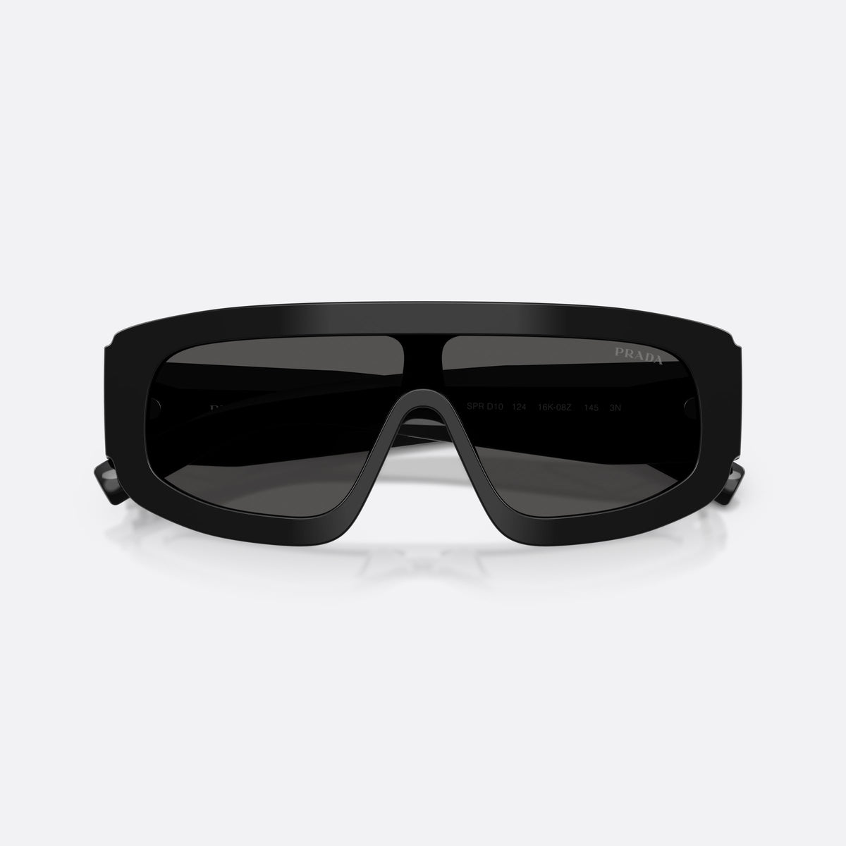 Prada PR D10S 16K08Z sunglasses, black irregular frame for men, single integrated bridge, brand lettering on lenses, folded